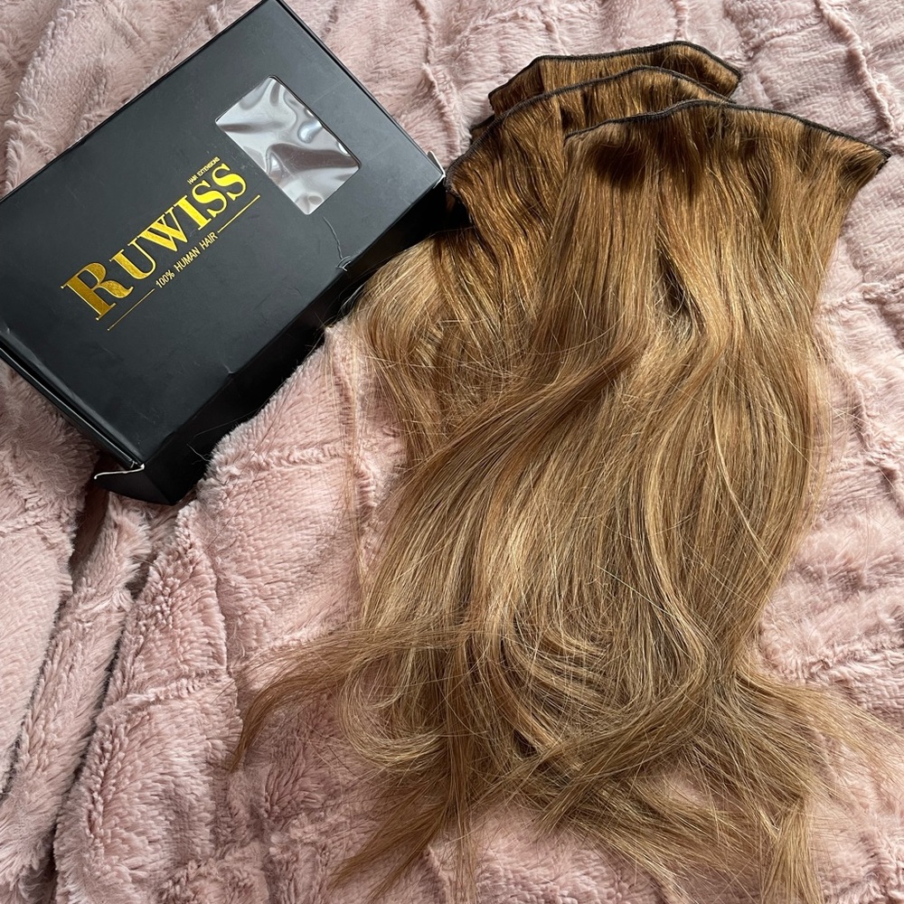 Clip in human hair extensions